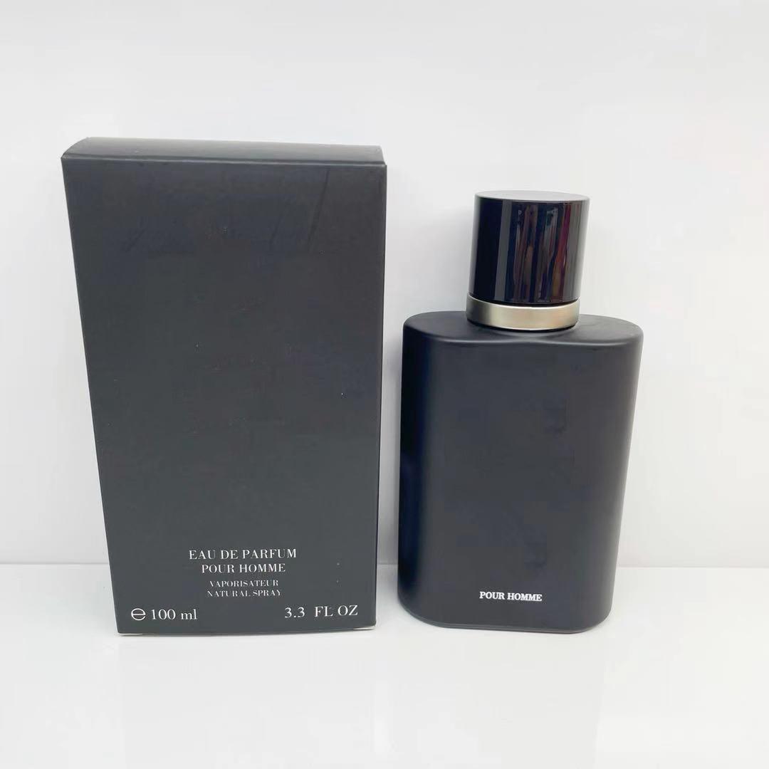 Black perfume bottle and packaging on a white background